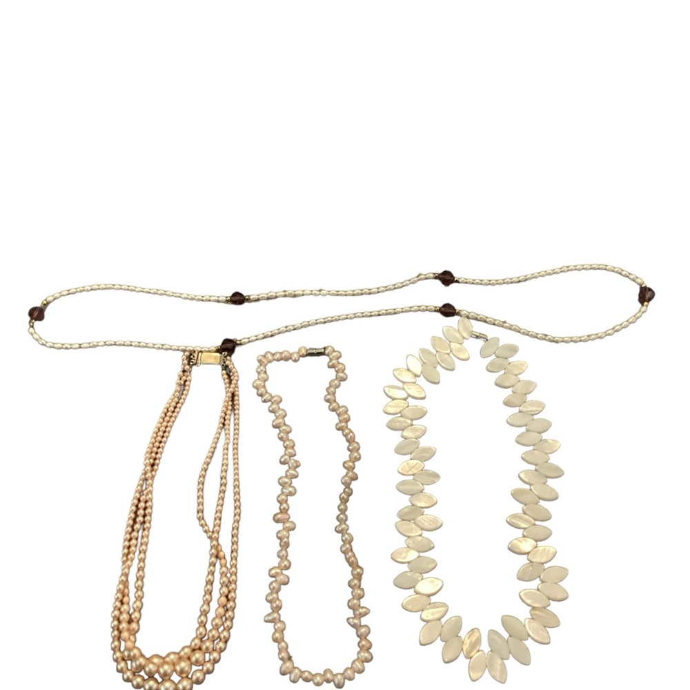 Bundle of 4 costume pearl colored necklaces in good condition